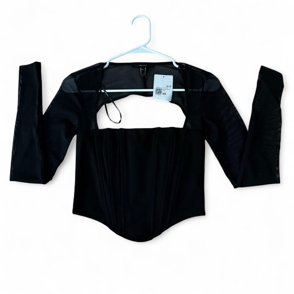 Black Forever 21 corset top with sheer long sleeves. Size XS. NWT